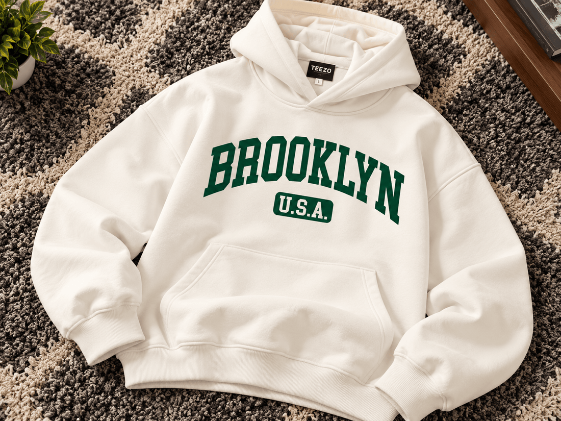 TEEZO off-white oversized hoodie with dark green Brooklyn USA varsity graphic