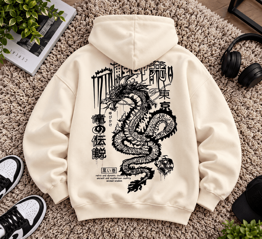 TEEZO off-white oversized hoodie with bold black Japanese dragon graphic and Japanese-inspired typography on the back, worn by a male model.