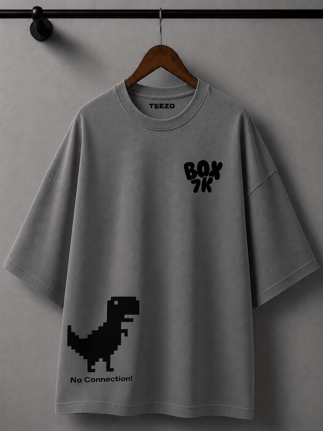 White oversized cotton T-shirt featuring a pixel dinosaur and No Connection graphic for unisex streetwear.