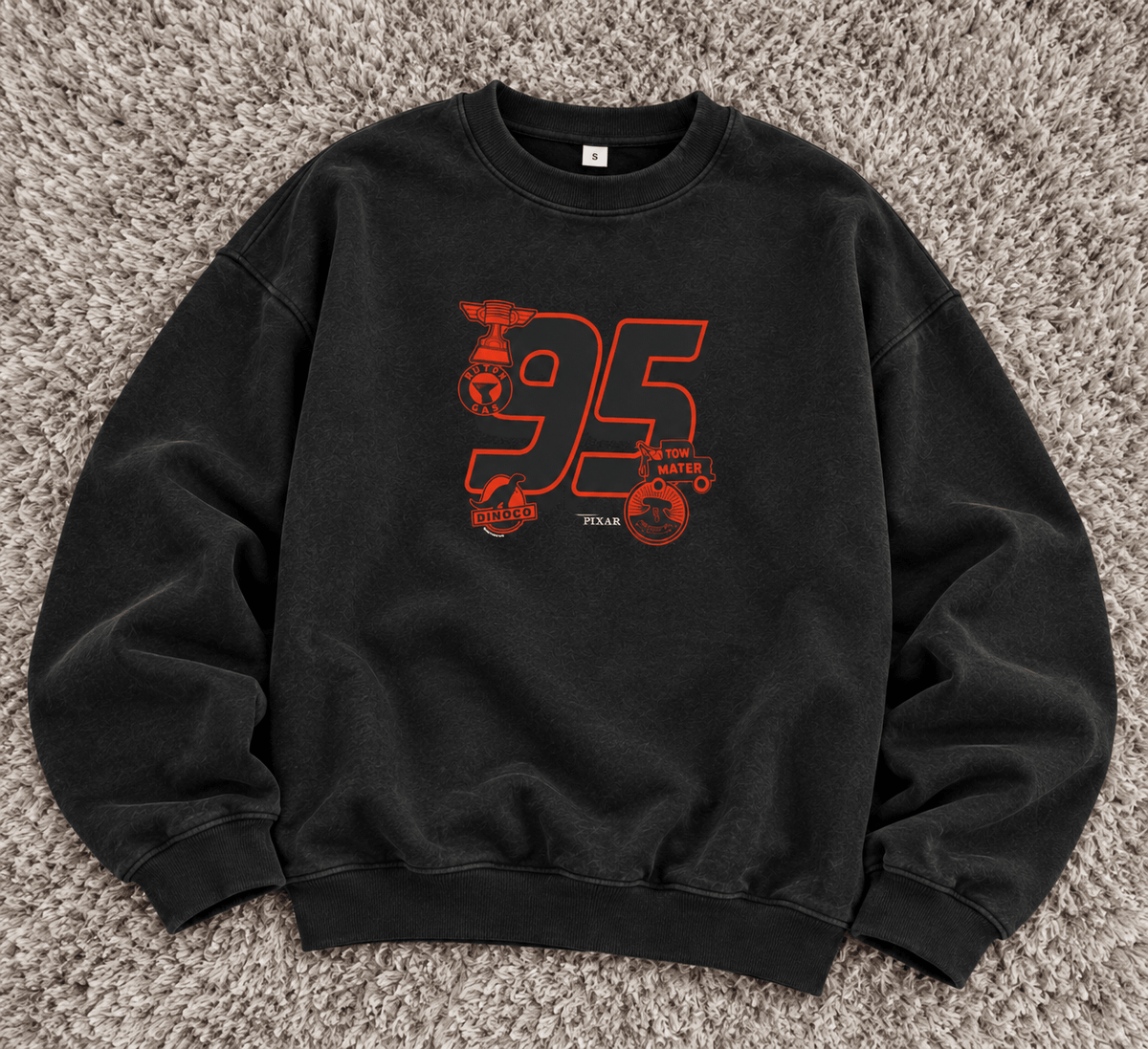 TEEZO Racing 95 oversized sweatshirt in washed black with red racing-inspired graphic, styled with black cargo pants