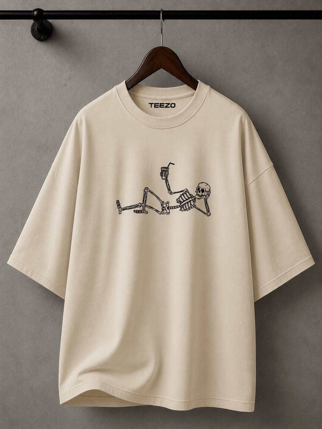 White oversized cotton T-shirt featuring a relaxed skeleton graphic for unisex streetwear.