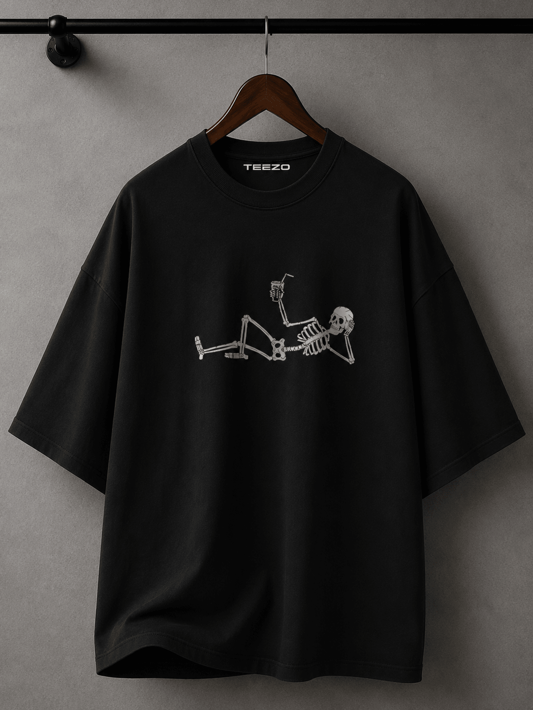 White oversized cotton T-shirt featuring a relaxed skeleton graphic for unisex streetwear.