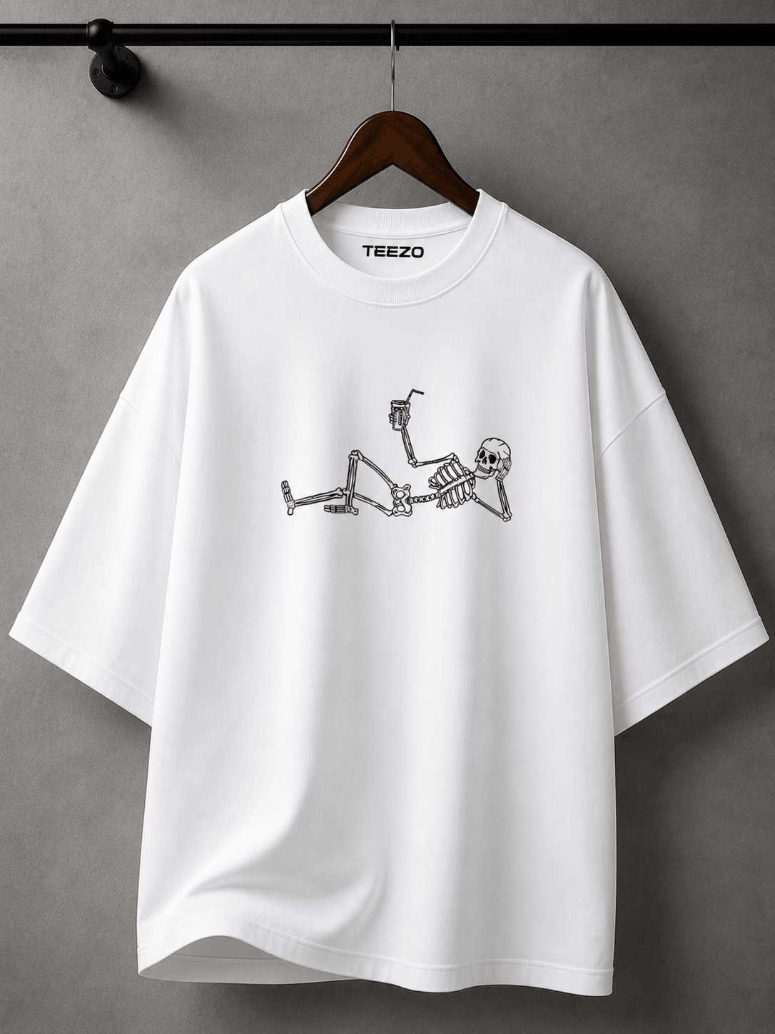 White oversized cotton T-shirt featuring a relaxed skeleton graphic for unisex streetwear.